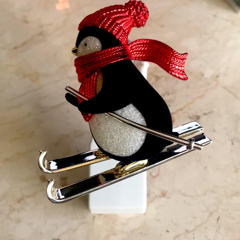 Bath and Bodywork’s Wallflowers fragrance plug in penguin skiing light holiday